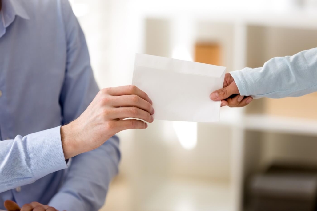 Closing the transfer of an envelope from hand to hand