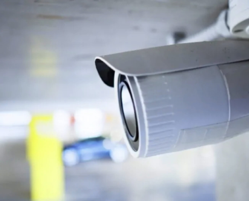 Closeup of a security camera in a parking lot to support premises liability in Texas